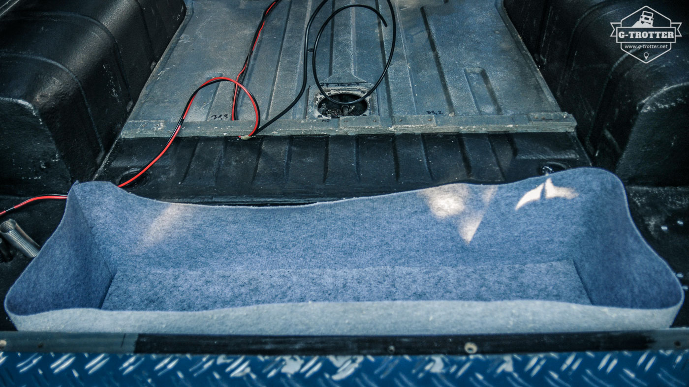 Insulating the compartment in the floor with Armaflex and coating it with carpet.