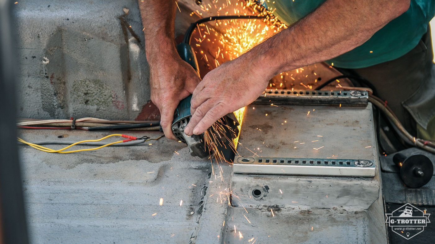 There was no need for a third seat. We removed it and its corresponding console with the angle grinder. 