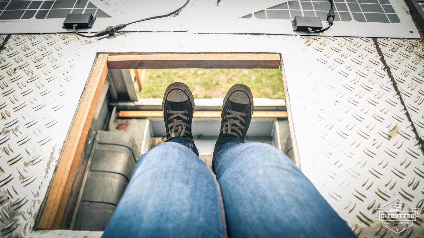 The windowless roof with already inserted self-made wooden frame.