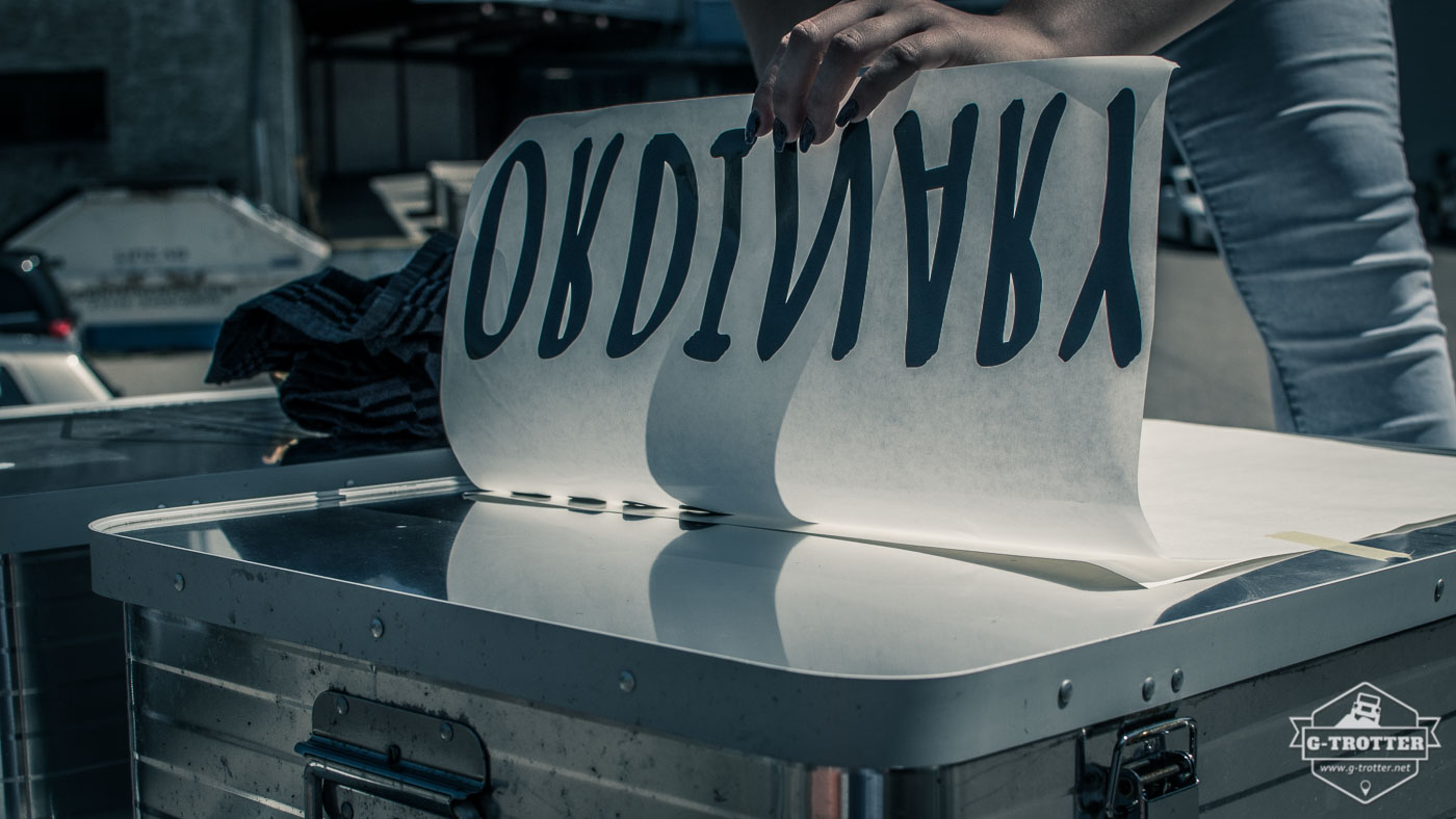 One of the aluminium boxes on the roof gets tagged with “A life less ordinary”.