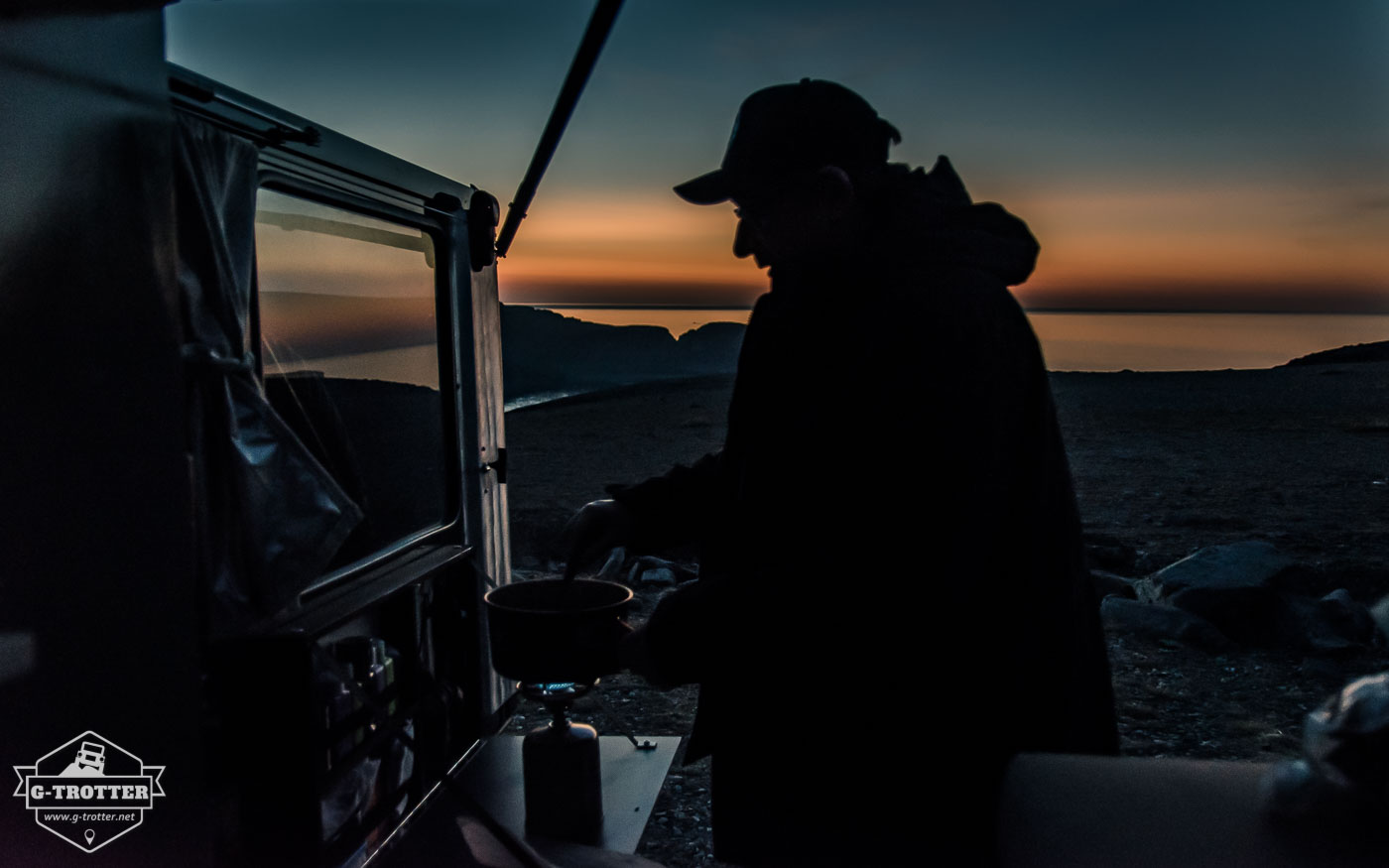 Cooking during the sunset at the North Cape. 